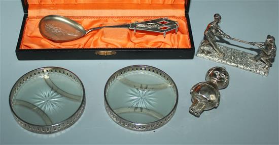 Continental silver spoon, cased, a pair of coasters and 2 other pieces